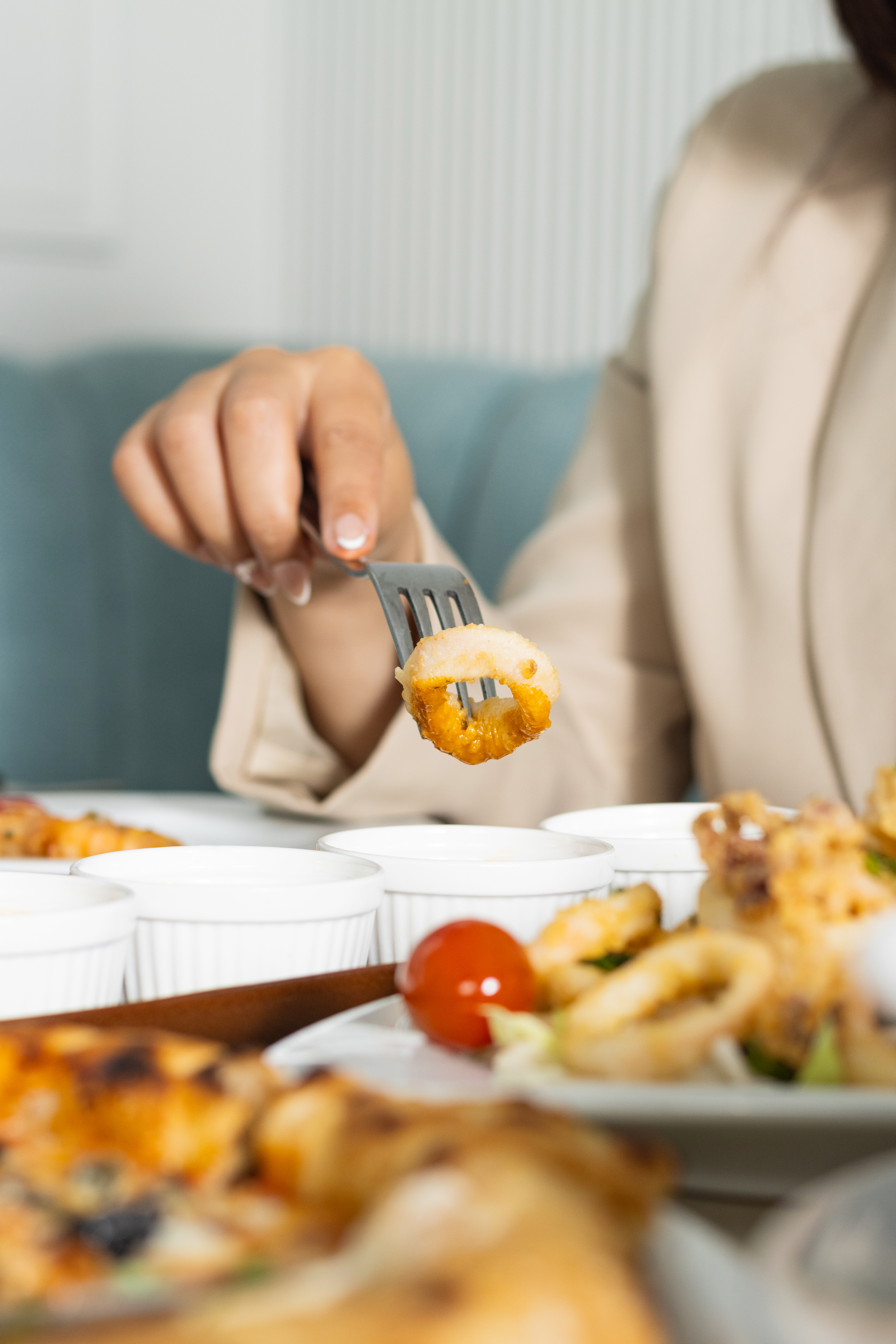 Food photography with a model at a seafood restaurant in Casablanca.
